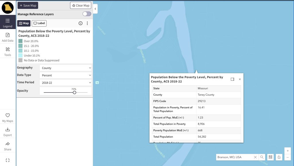 A popup appears on a map for information on population below the poverty level in Branson, MO. 